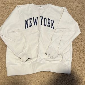brandy Melville crewneck, it fits like a small/extra small, light tan color
